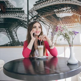 young-girl-smiling-talking-phone