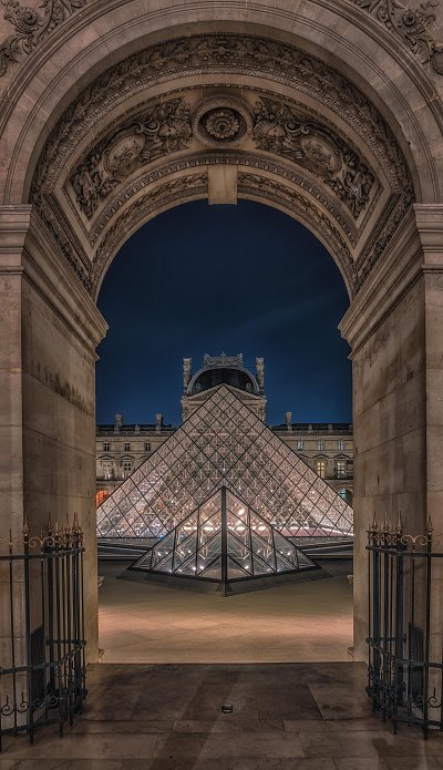 louvre-pyramid-night-through-archway