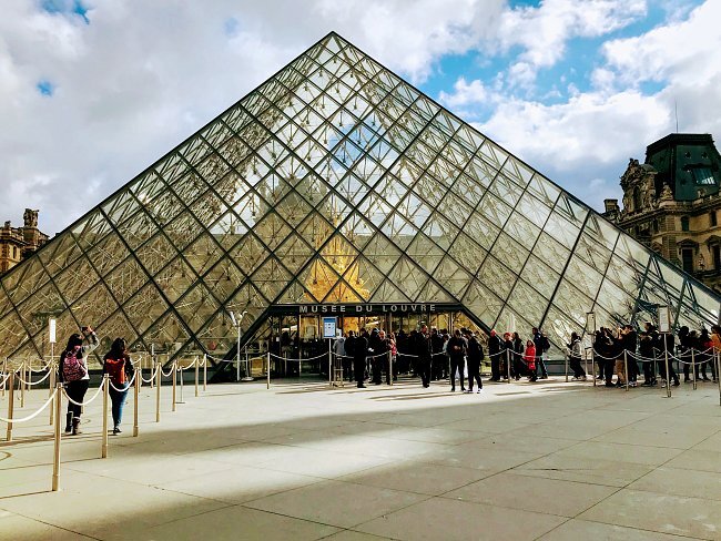 large-glass-pyramid-with-sign-that-says-pyramid